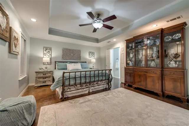 a bedroom with furniture and window