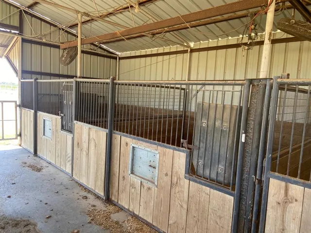 a view of a balcony with wooden floor