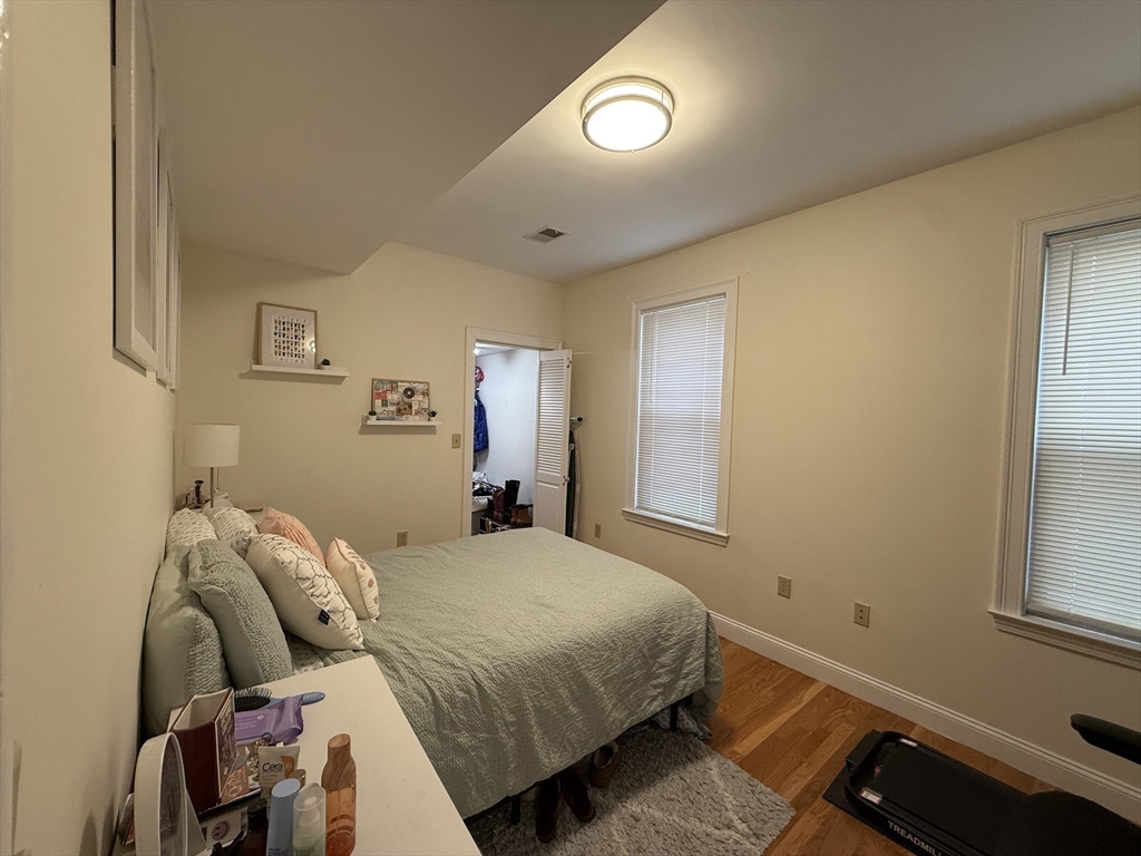 106 Chester Street, Unit 2 Boston, MA 02134 - Photo 6 of 9 a bedroom with a bed and a window