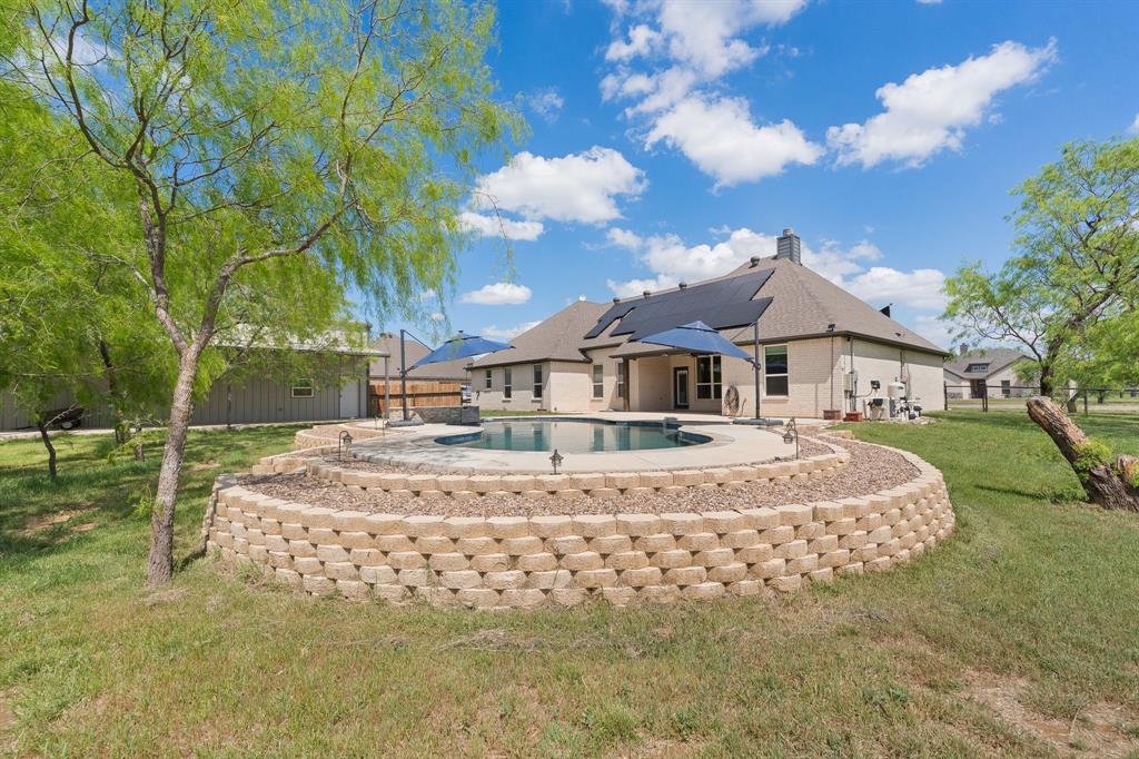 1001 Resolute Road Millsap, TX 76066 - Photo 35 of 40 a view of a house with a yard