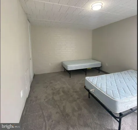 a room with a bed and a couch