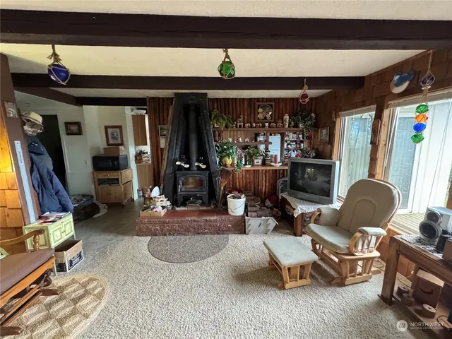 a room with gym equipment and a large window