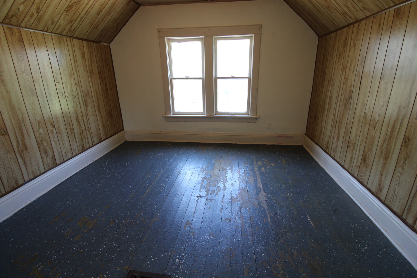 1176 22nd Street Moline, IL 61265 - Photo 11 of 19 an empty room with wooden floor and windows