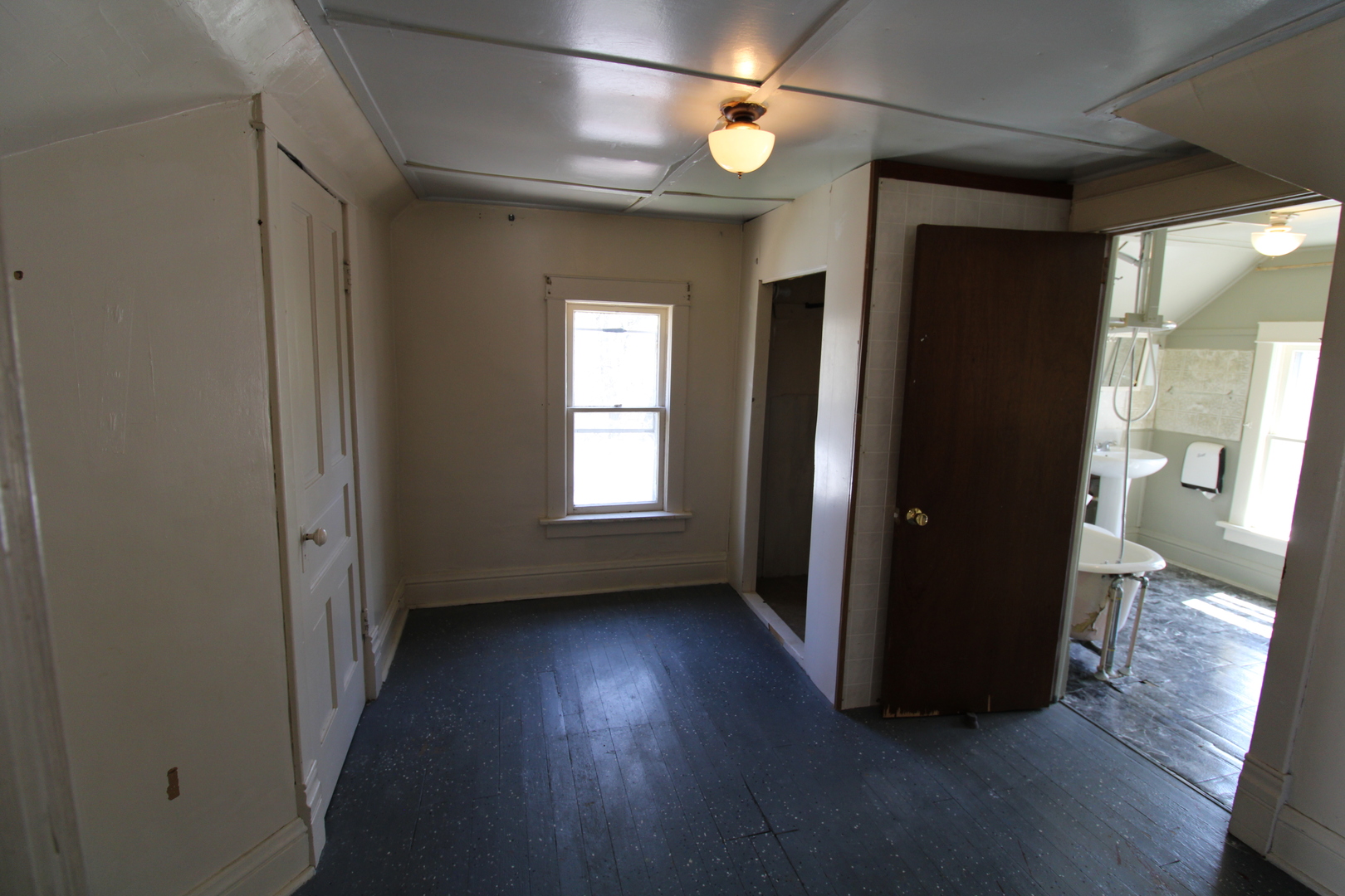 1176 22nd Street Moline, IL 61265 - Photo 13 of 19 wooden floor in an empty room with a window