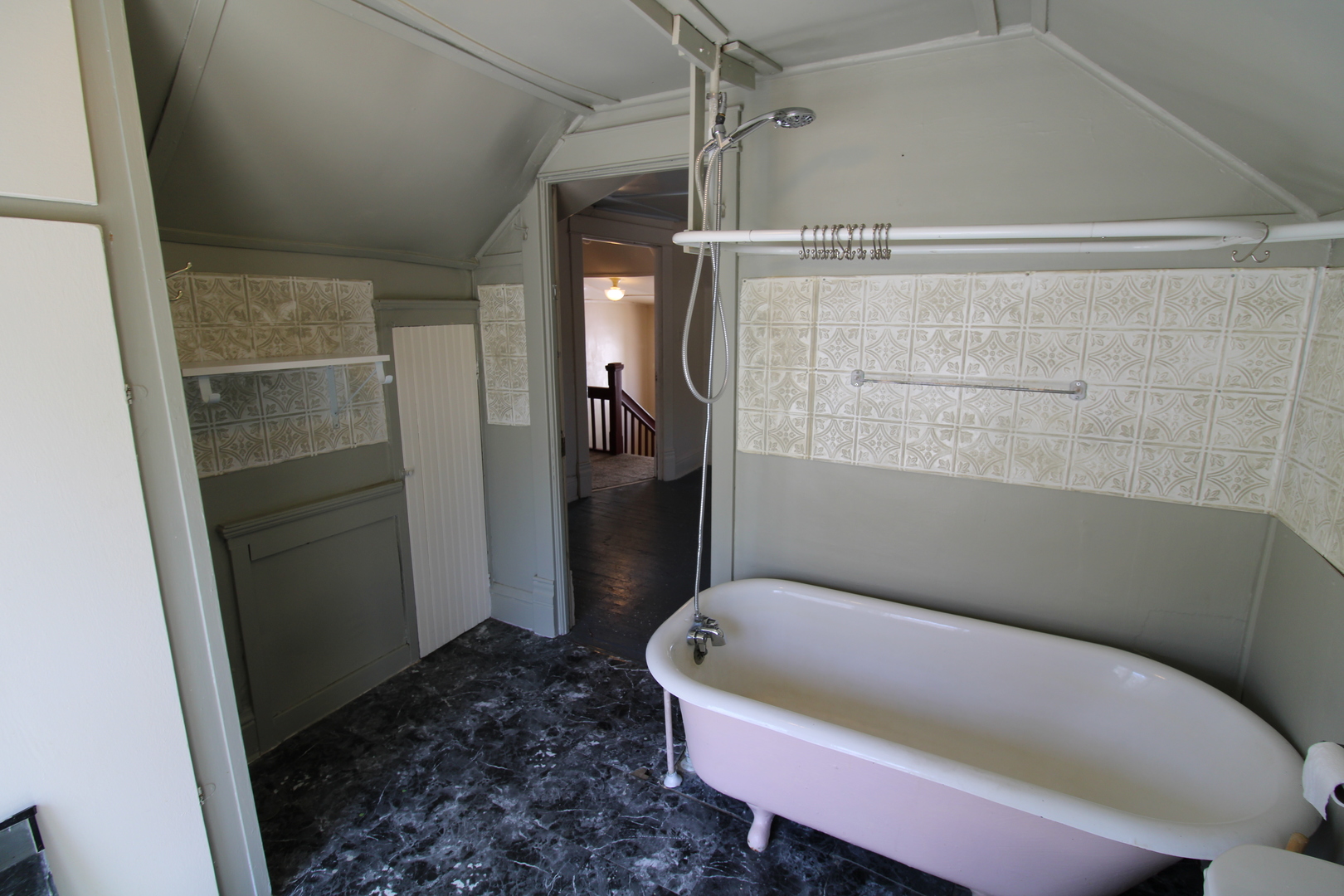 1176 22nd Street Moline, IL 61265 - Photo 15 of 19 a bathroom with a tub and shower