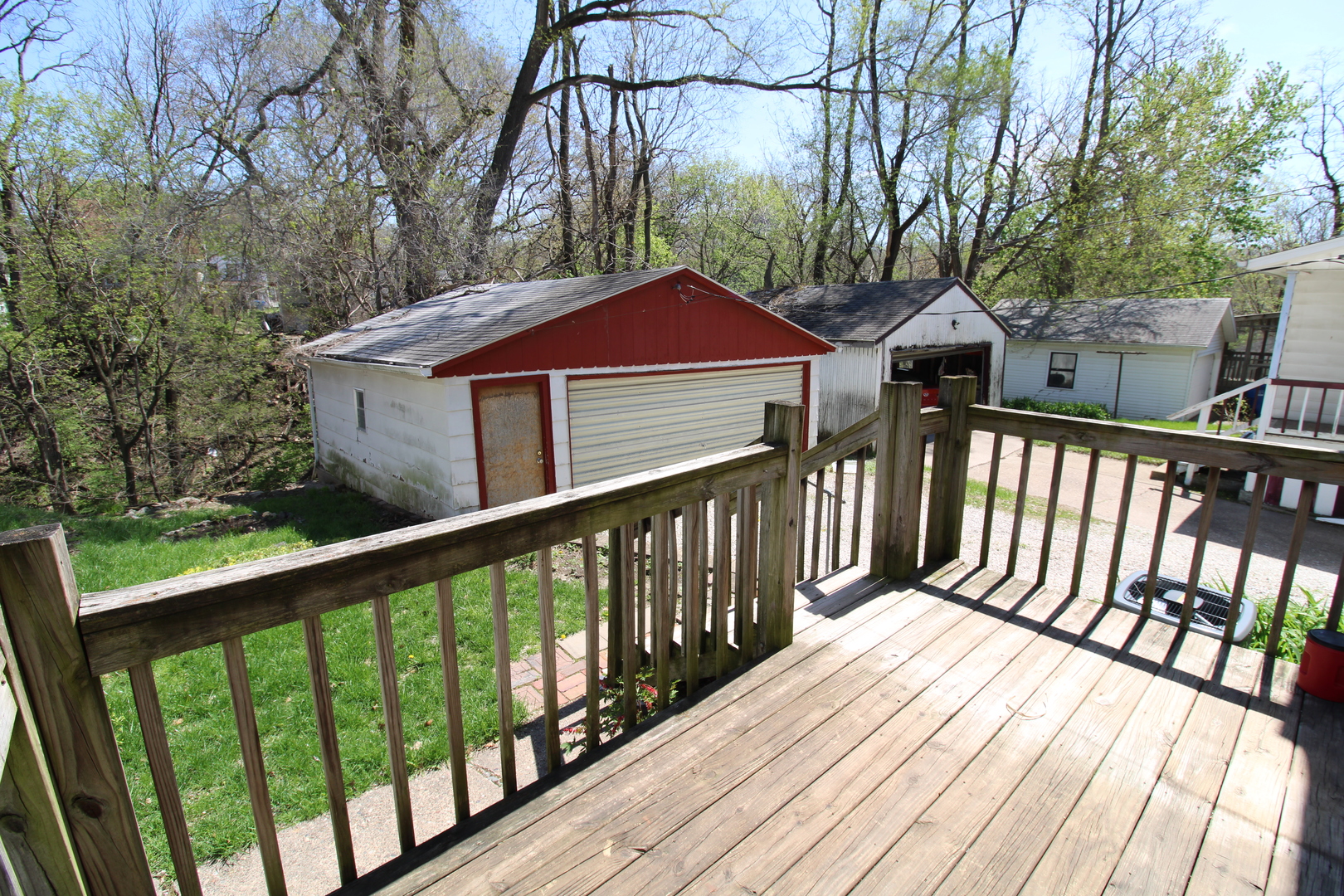 1176 22nd Street Moline, IL 61265 - Photo 17 of 19 a view of a wooden deck with a yard