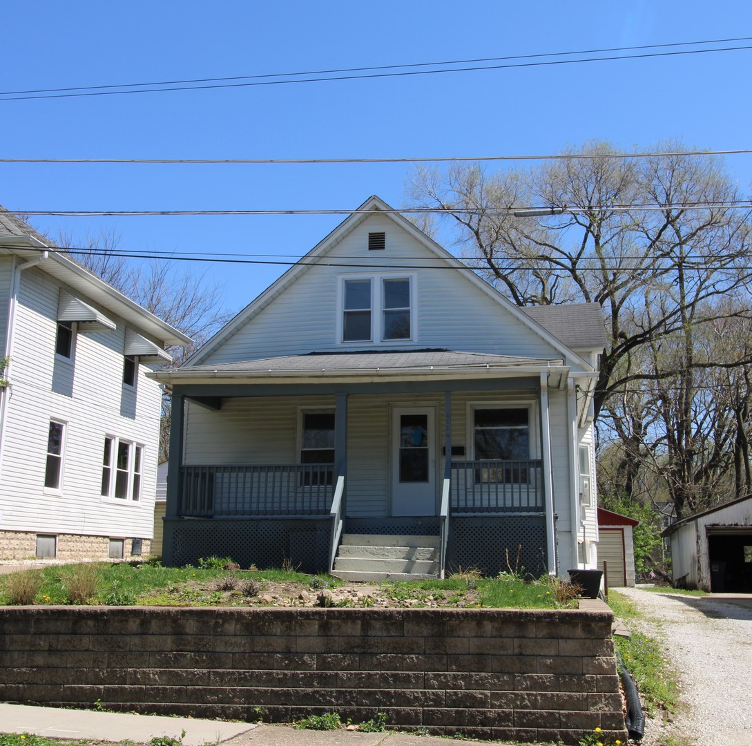 1176 22nd Street Moline, IL 61265 - Photo 2 of 19 a view of a house with a yard