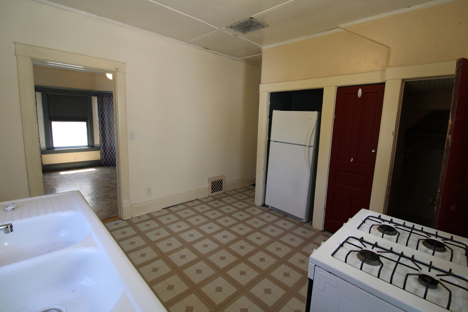 1176 22nd Street Moline, IL 61265 - Photo 6 of 19 a bedroom with a bed and a sink