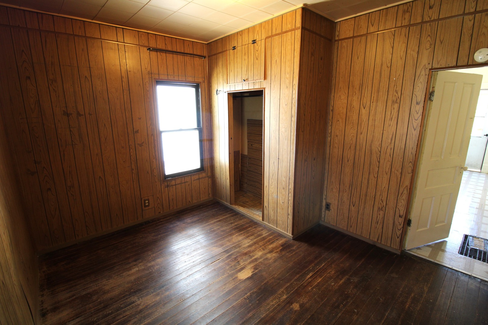 1176 22nd Street Moline, IL 61265 - Photo 9 of 19 a view of entryway with wooden floor