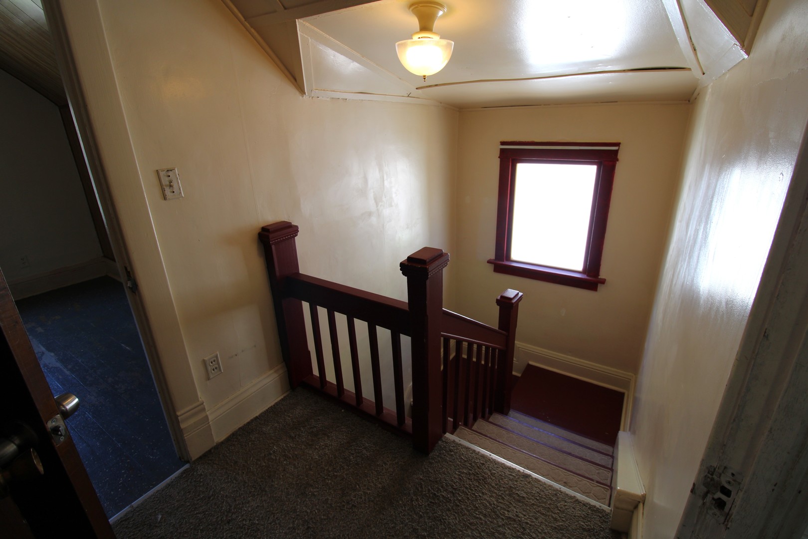 1176 22nd Street Moline, IL 61265 - Photo 10 of 19 a view of a hallway with windows