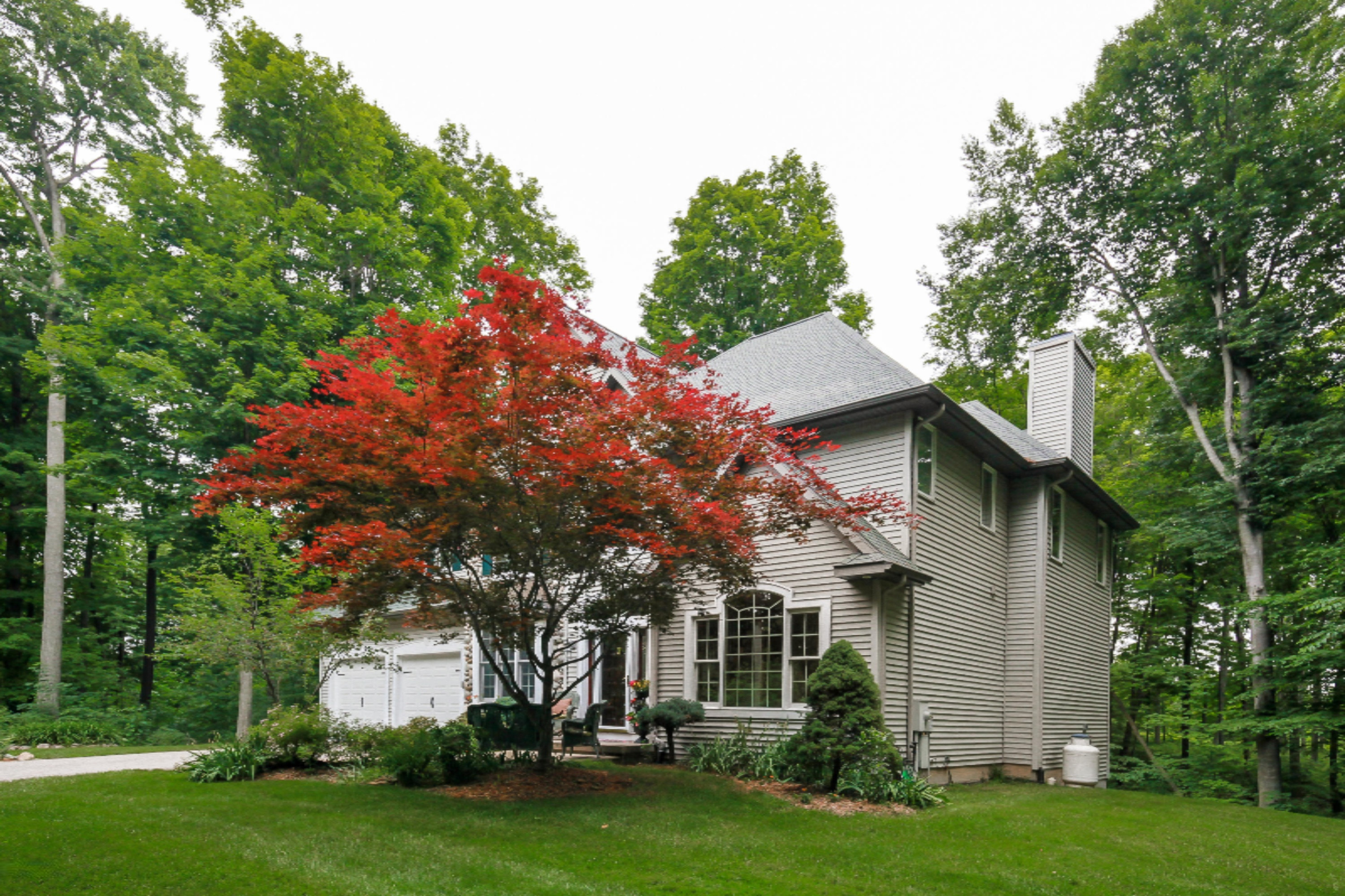 6581 Riverside Lane Middleville, MI 49333 - Photo 3 of 35 002-Front_View-5921614-print