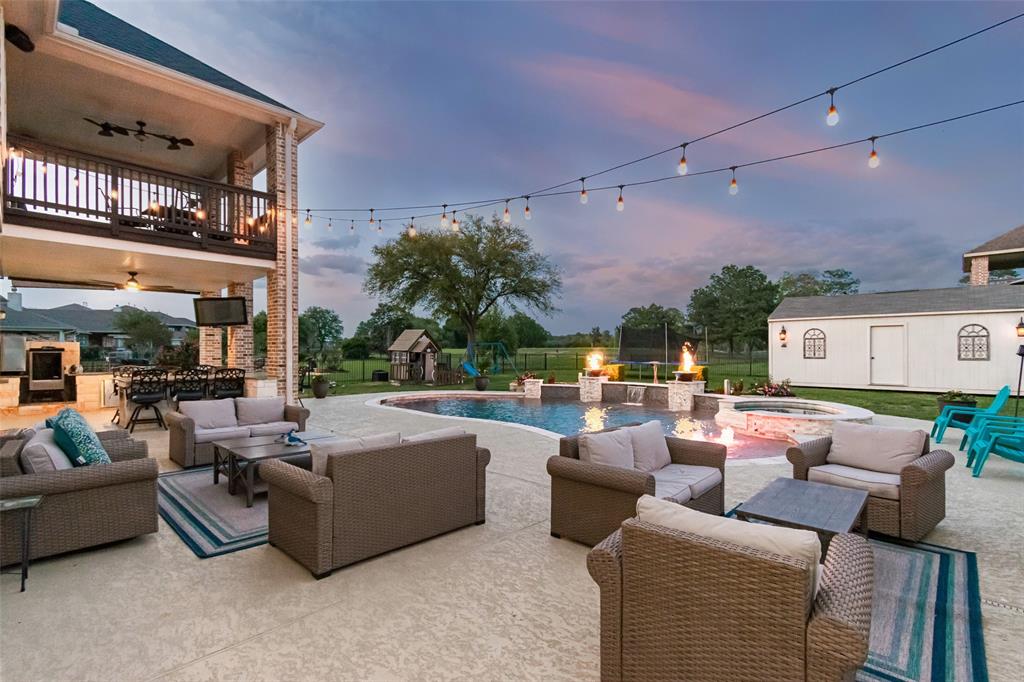 a outdoor living space with patio furniture and a potted plant