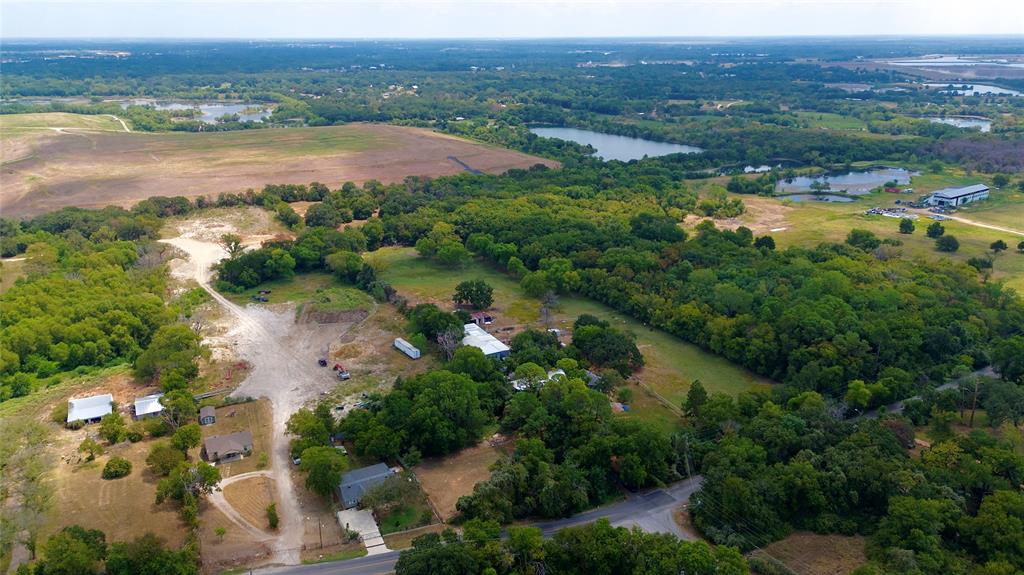 1900 Haymarket Road Dallas, TX 75253 - Photo 7 of 14 an aerial view of lake residential house with outdoor space and trees