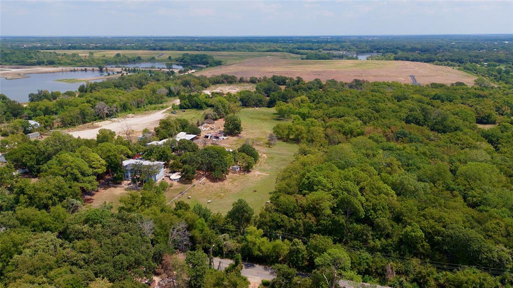 1900 Haymarket Road Dallas, TX 75253 - Photo 10 of 14 a view of a lake and green valley