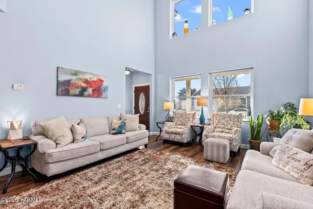 a kitchen with a refrigerator and cabinets
