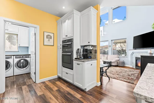 a view of a house with a snow on the road