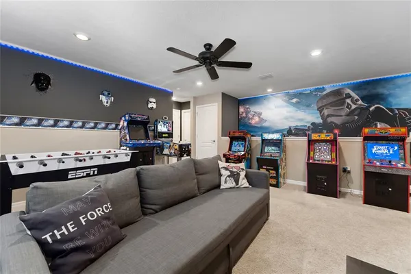 a bedroom that has a bed and a table in it