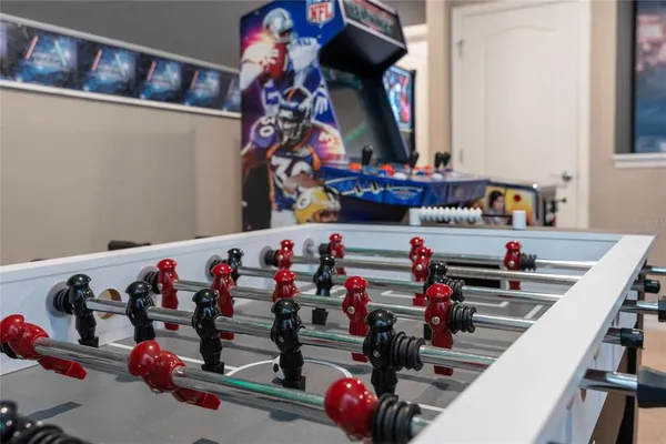 a bedroom with a bed and a tv in it