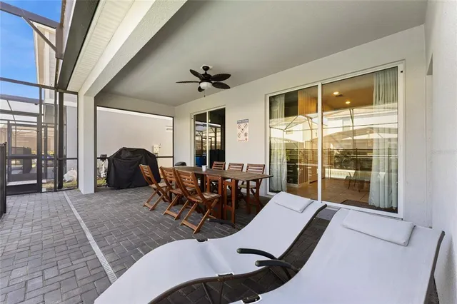 a aerial view of a house with a swimming pool