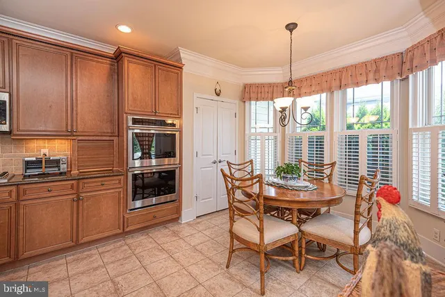 an aerial view of a house with a lake view