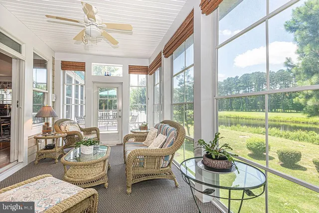 an aerial view of a house with a garden and a yard