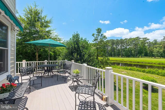 an aerial view of a house with yard swimming pool and outdoor seating