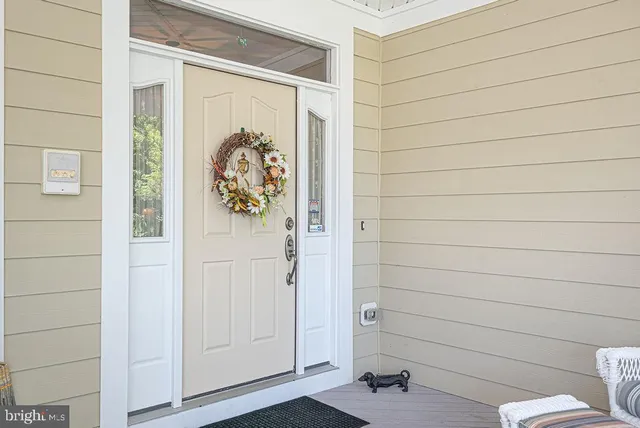 a living room with furniture fireplace and flat screen tv
