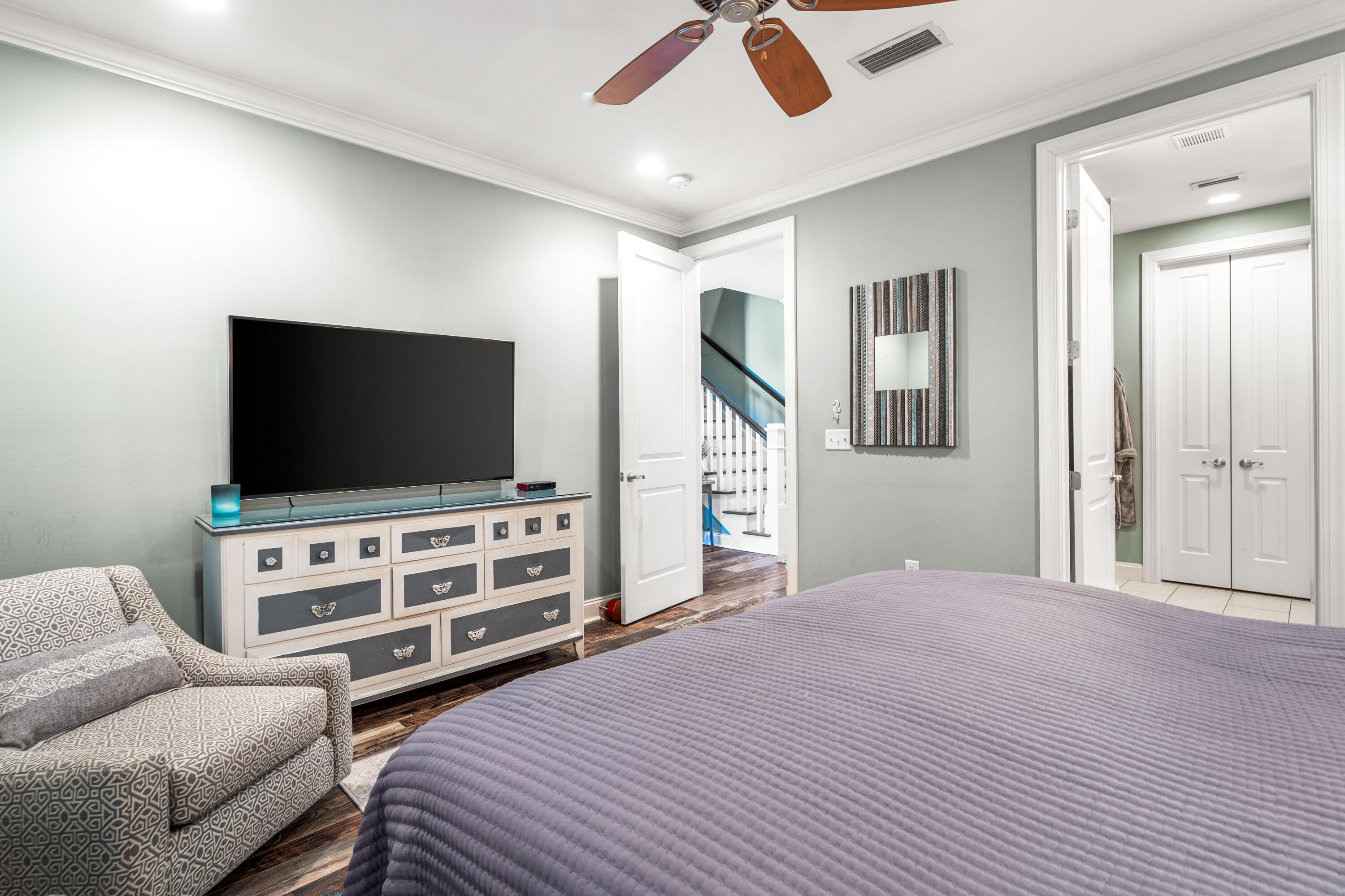 83 Hatton Court Santa Rosa Beach, FL 32459 - Photo 13 of 42 a bedroom with furniture and a flat screen tv