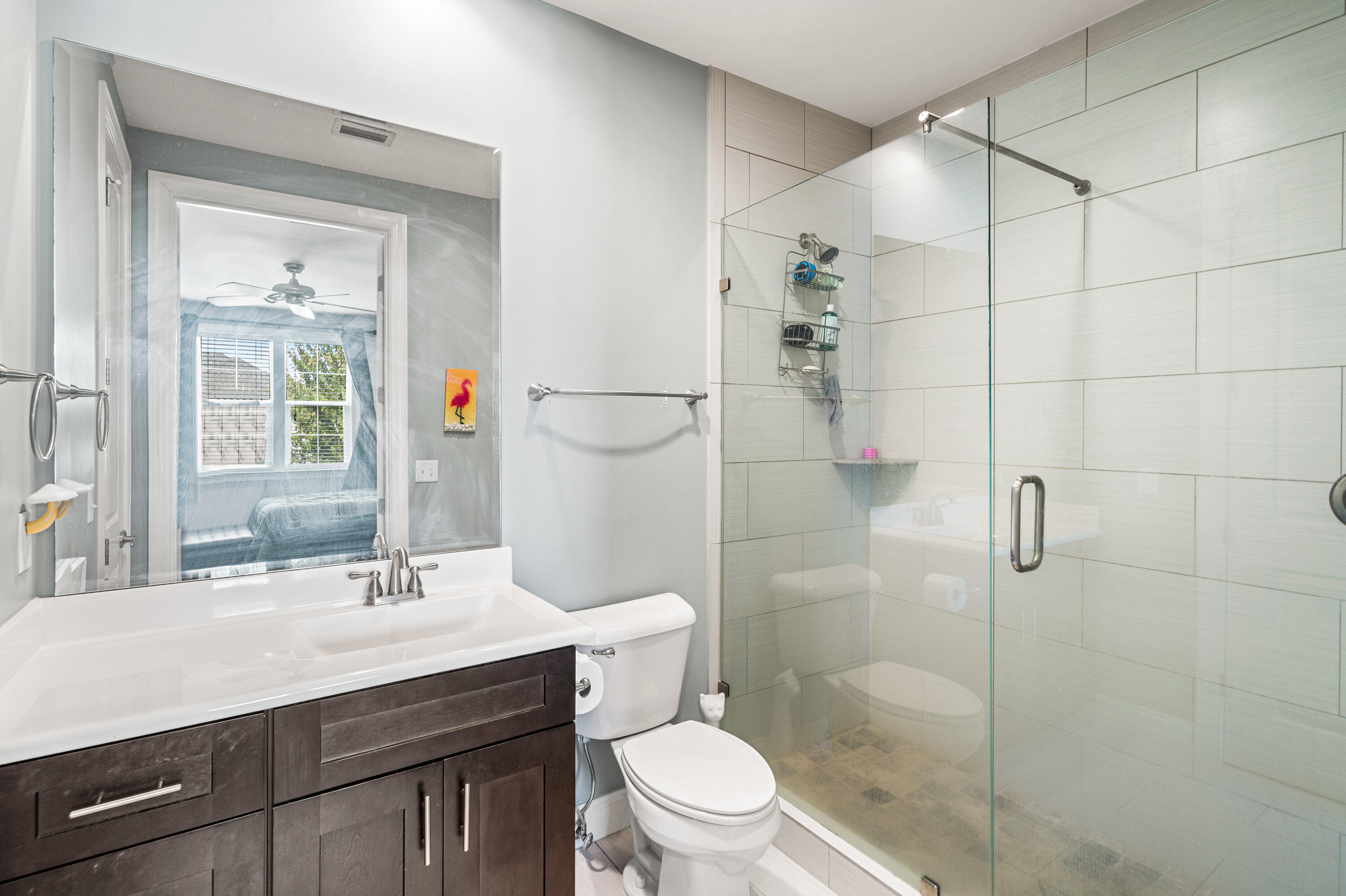 83 Hatton Court Santa Rosa Beach, FL 32459 - Photo 26 of 42 a bathroom with a sink a toilet and shower