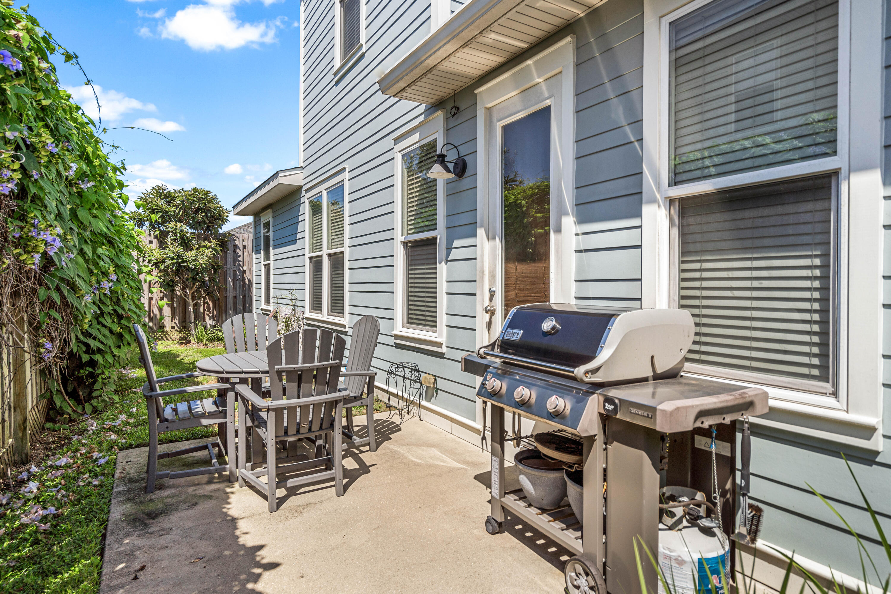 83 Hatton Court Santa Rosa Beach, FL 32459 - Photo 27 of 42 a view of a patio with a table and chairs