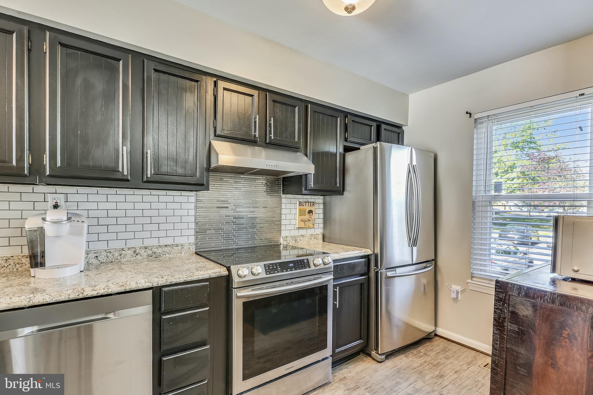 3003 Shepperton Terrace Silver Spring, MD 20904 - Photo 4 of 37 Ample storage and light, SAMSUNG appliances.