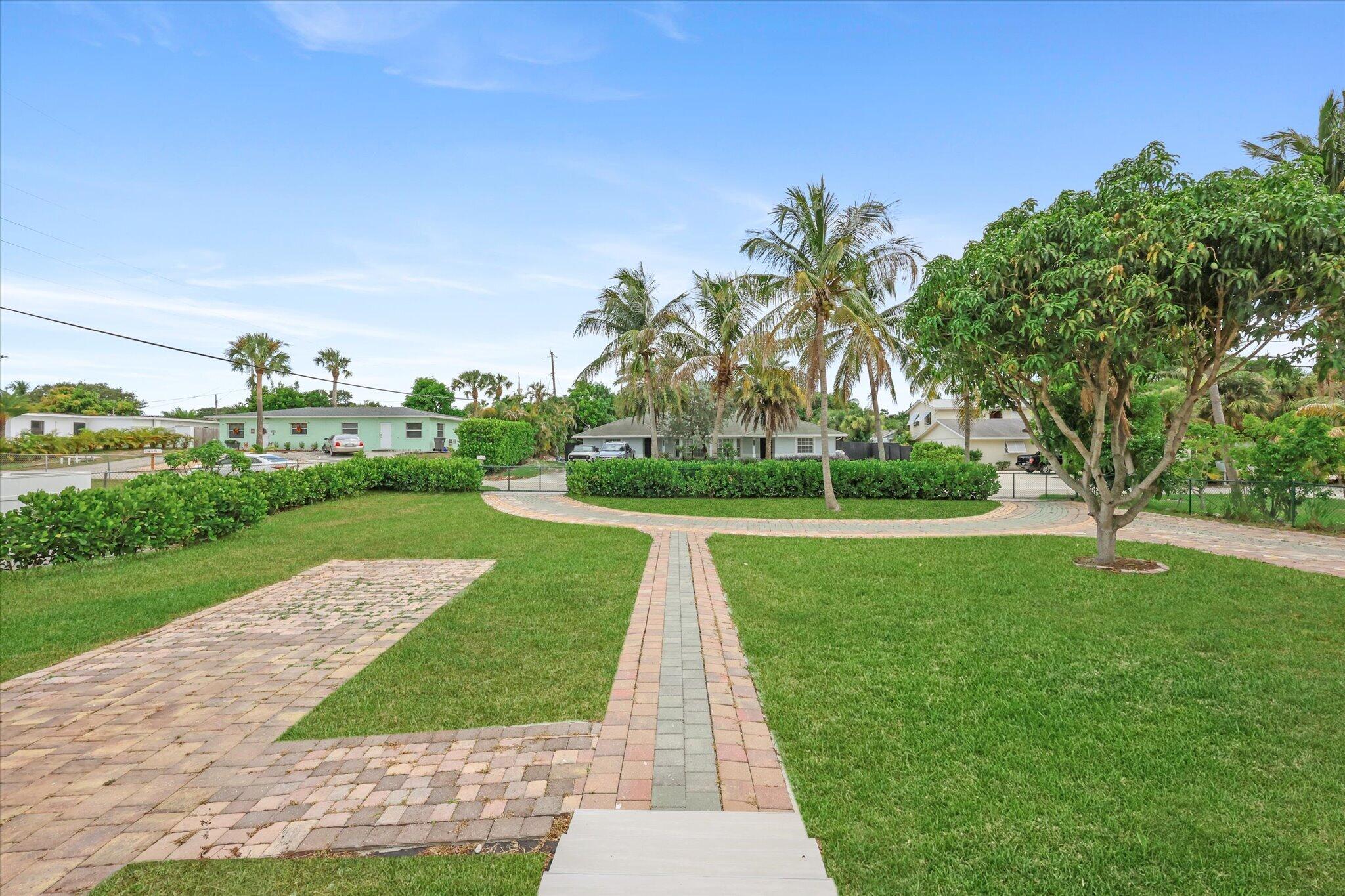 1803 Service Road North Palm Beach, FL 33408 - Photo 1 of 51 01-1