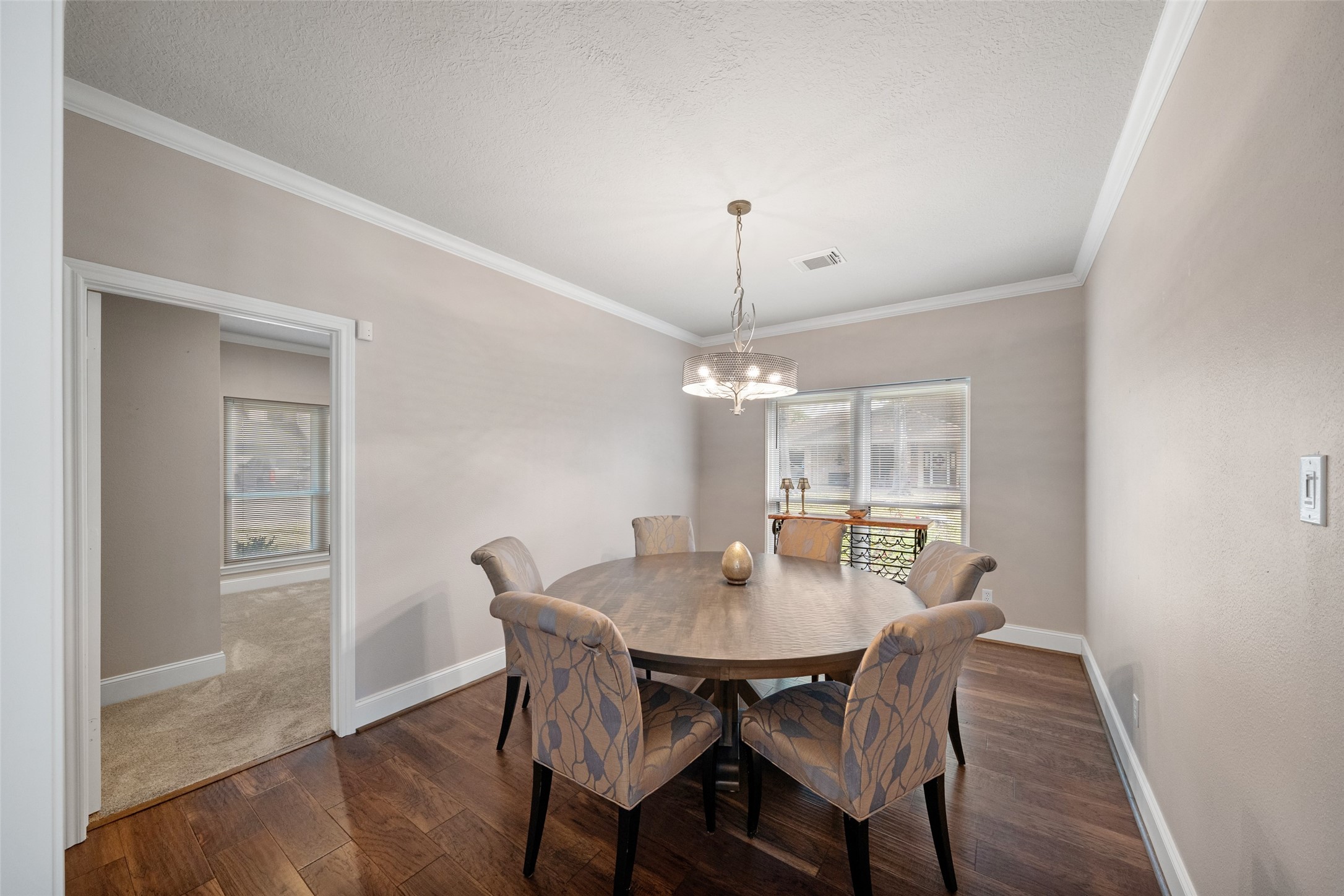 20256 Ivy Point Circle Humble, TX 77346 - Photo 13 of 36 a view of a dining room with furniture window and wooden floor