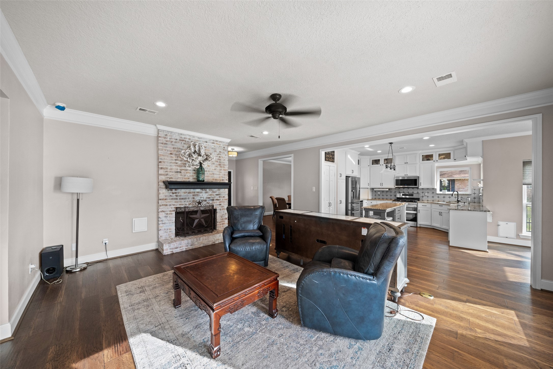 20256 Ivy Point Circle Humble, TX 77346 - Photo 6 of 36 a living room with furniture and a fireplace