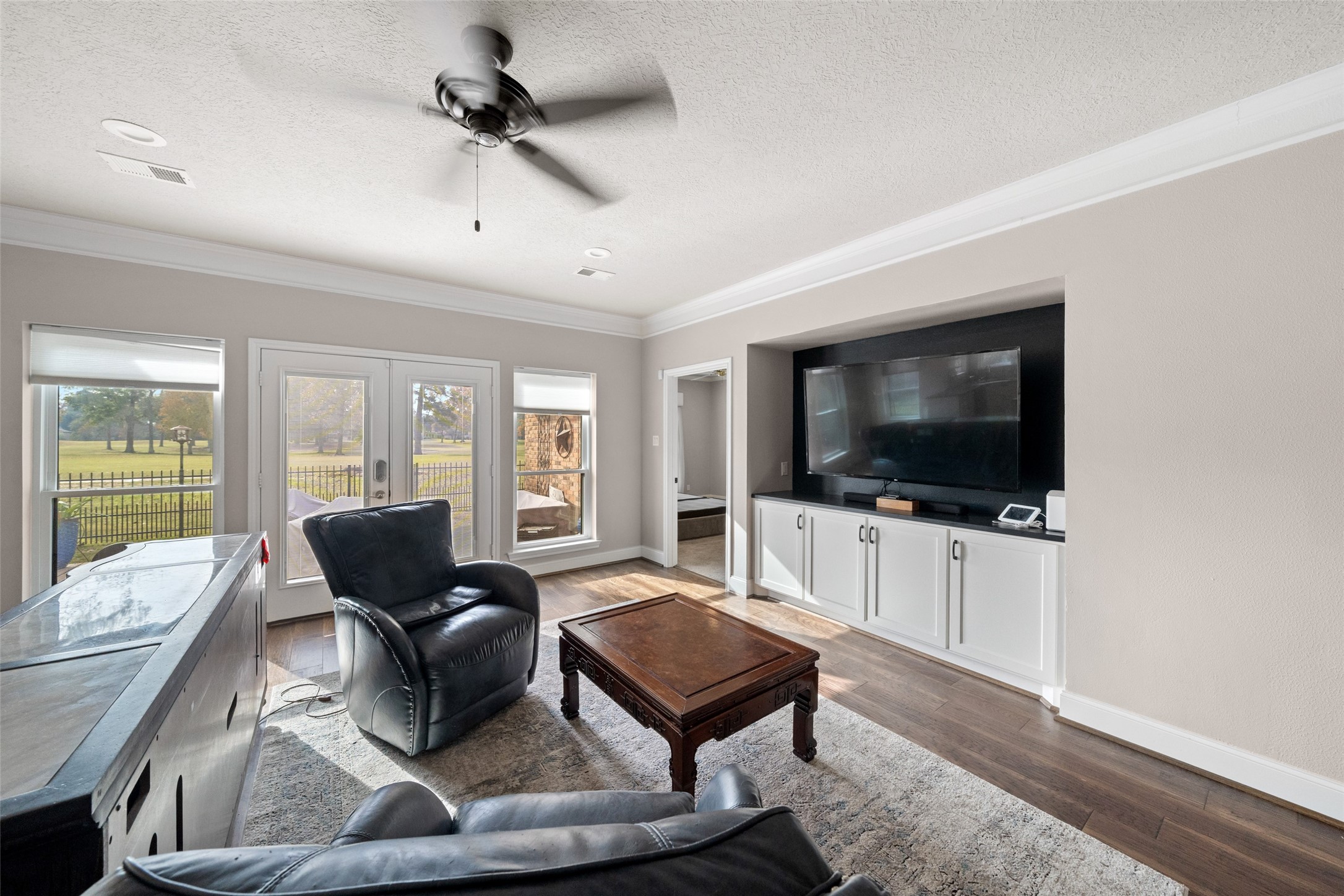 20256 Ivy Point Circle Humble, TX 77346 - Photo 10 of 36 a living room with furniture and a flat screen tv
