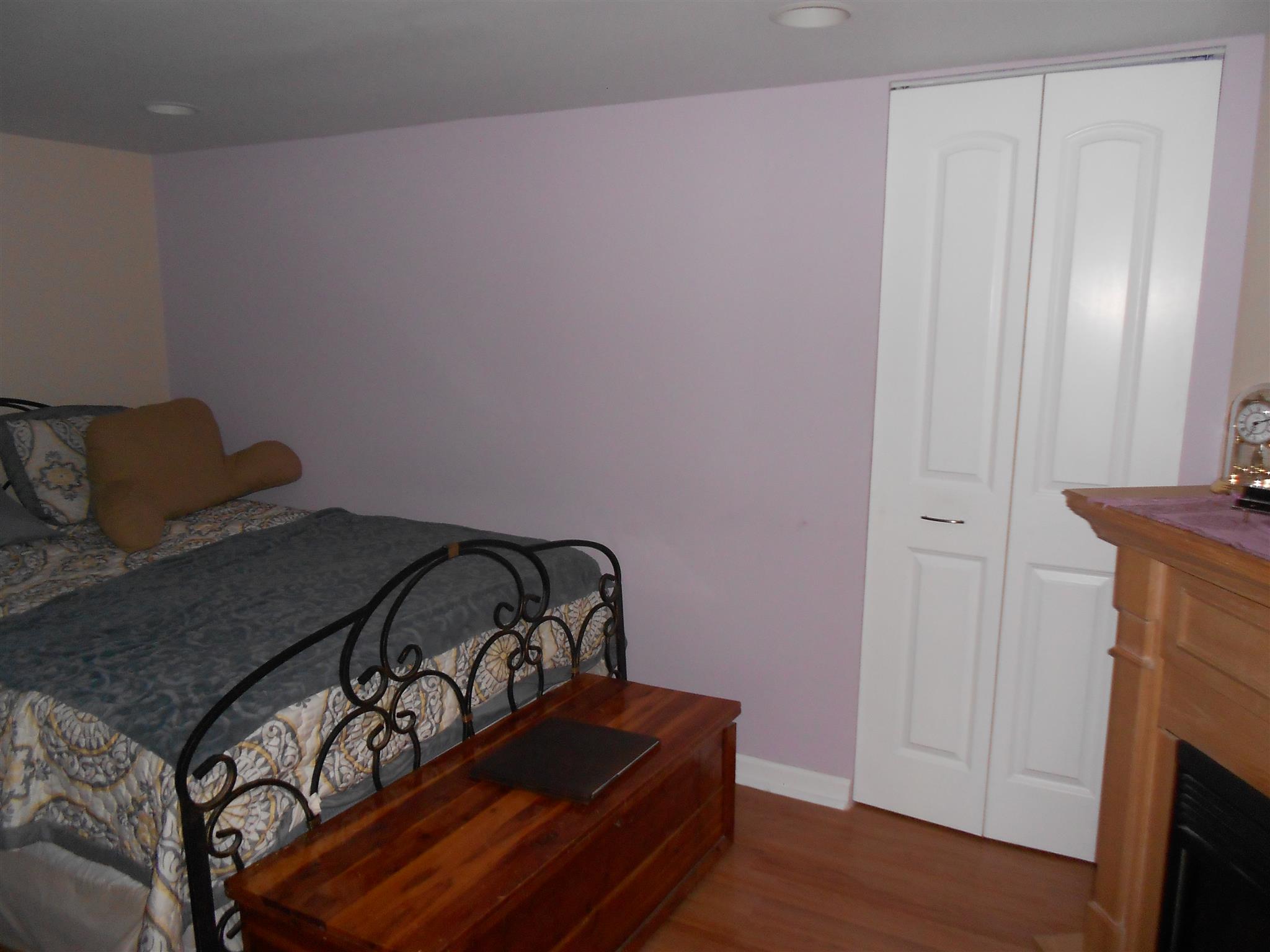 314 Gates Road Goodlettsville, TN 37072 - Photo 21 of 29 a bedroom with a bed and wooden floor