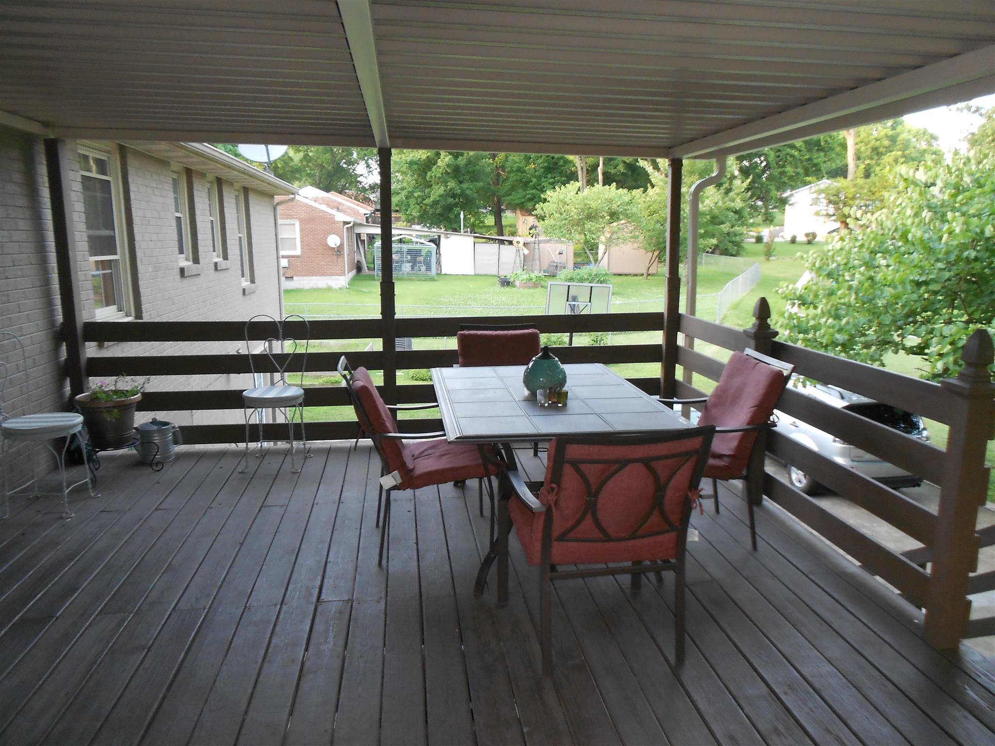 314 Gates Road Goodlettsville, TN 37072 - Photo 25 of 29 a view of a patio with a table chairs and a backyard