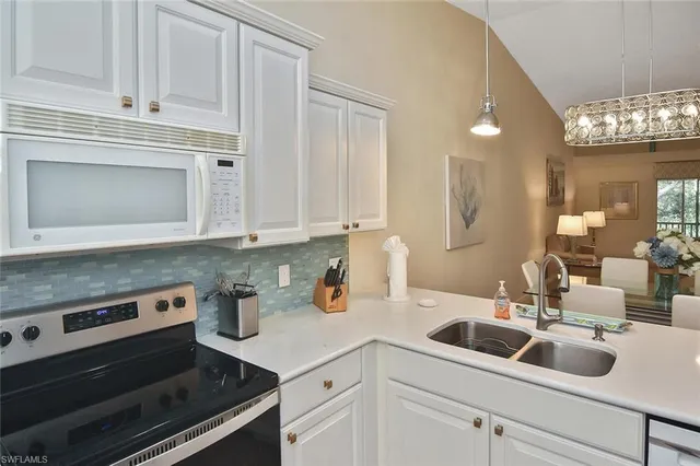 a bedroom with furniture and flat screen tv