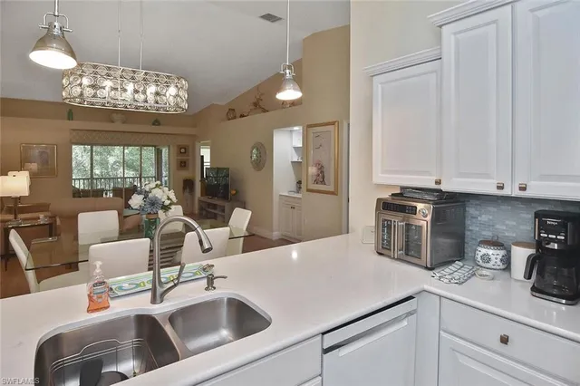 a bedroom with bed and window