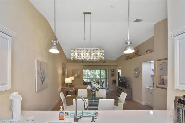 a bedroom with a bed and a lamp with window