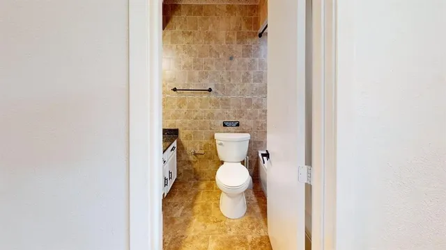 a bathroom with a toilet