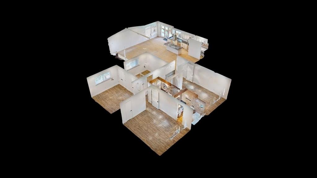 2131 Blossom Lane Richardson, TX 75081 - Photo 17 of 22 a picture of table with wooden floor