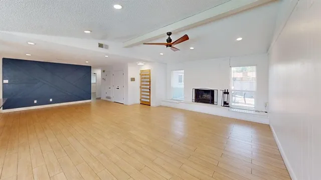 a view of a livingroom with a fireplace