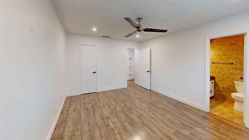 2131 Blossom Lane Richardson, TX 75081 - Photo 7 of 22 a view of empty room with wooden floor