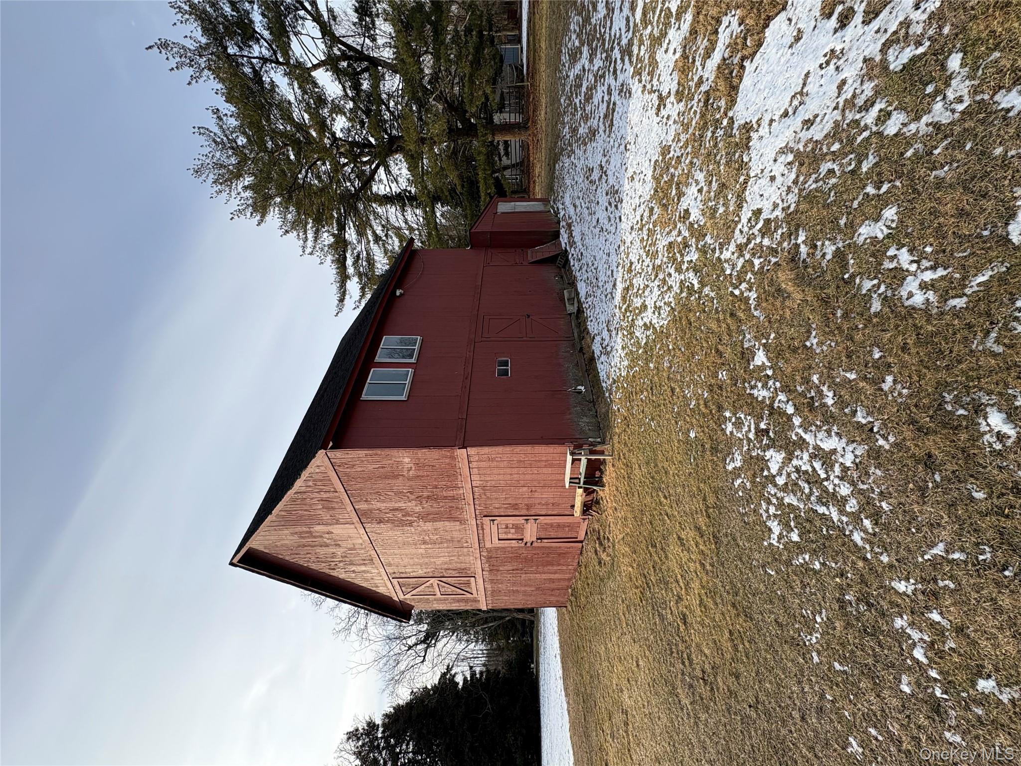 58 Coram Swezeytown Road Middle Island, NY 11953 - Photo 15 of 26 a view of a backyard