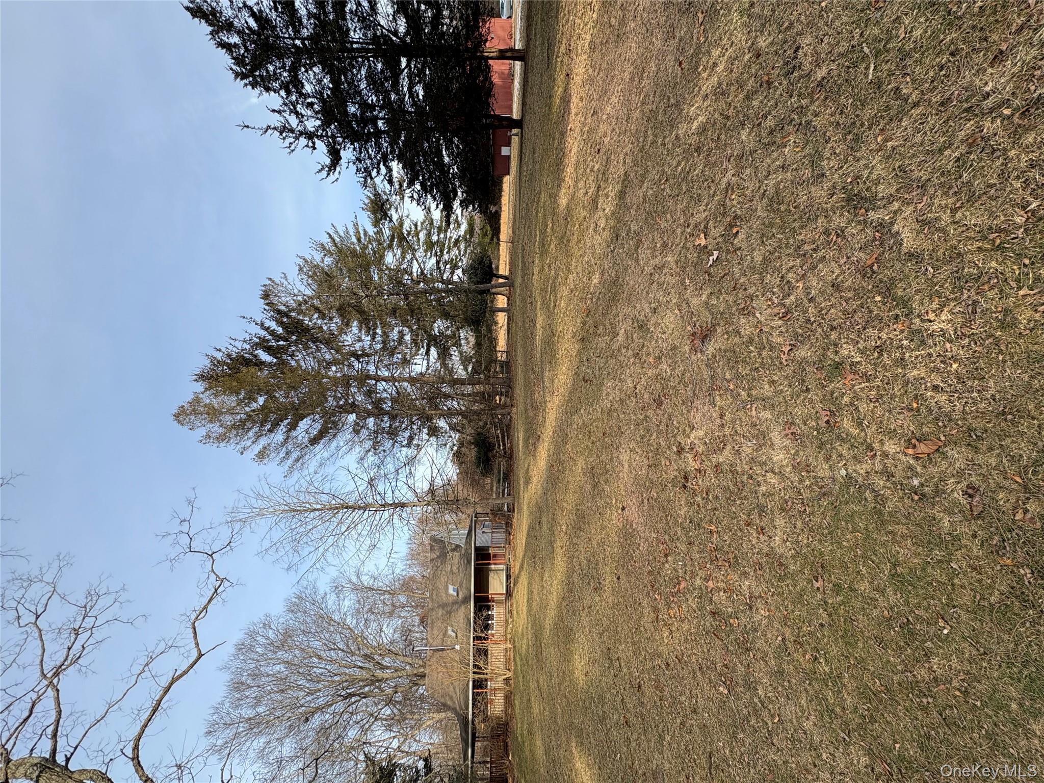 58 Coram Swezeytown Road Middle Island, NY 11953 - Photo 17 of 26 a view of an ocean and beach