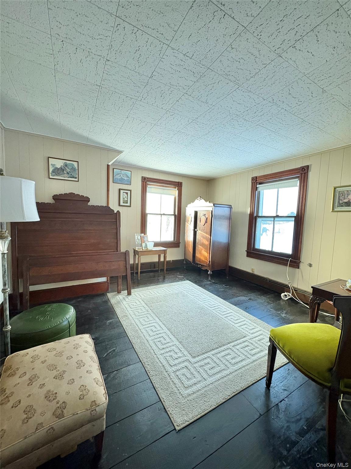 58 Coram Swezeytown Road Middle Island, NY 11953 - Photo 24 of 26 a bedroom with a bed window and couch