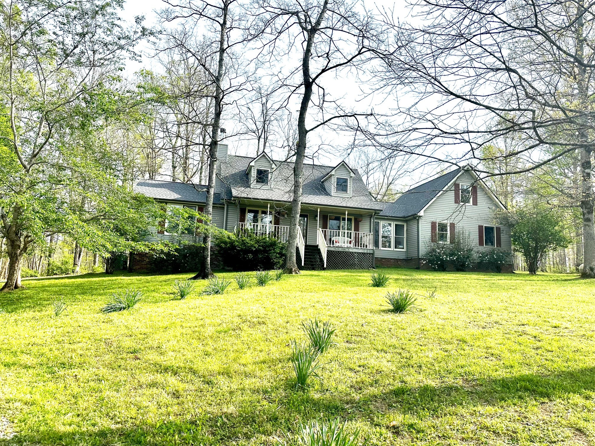 5292 Old Harding Road Franklin, TN 37064 - Photo 1 of 25 a view of a house with a yard and sitting area
