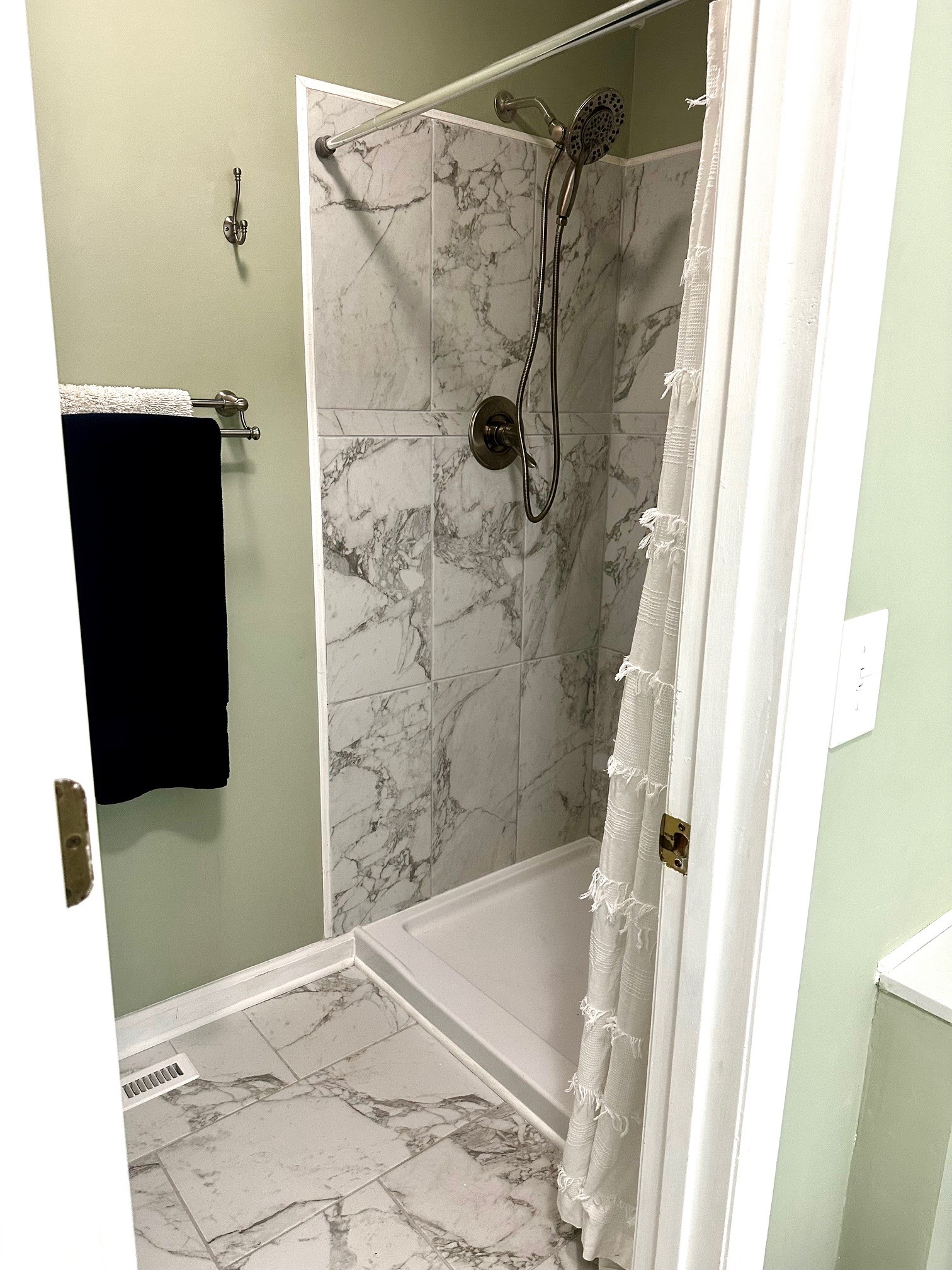 5292 Old Harding Road Franklin, TN 37064 - Photo 16 of 25 a bathroom with a shower and a mirror