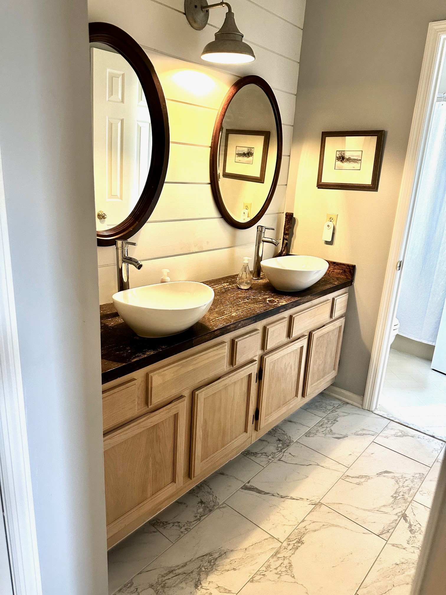 5292 Old Harding Road Franklin, TN 37064 - Photo 22 of 25 a bathroom with a sink and a mirror